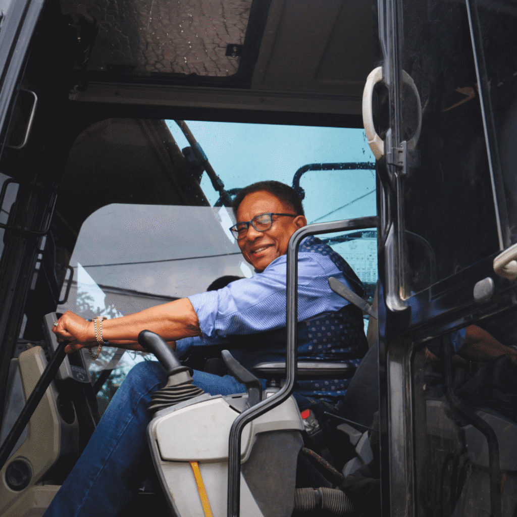 Paul Lewis operating heavy equipment
